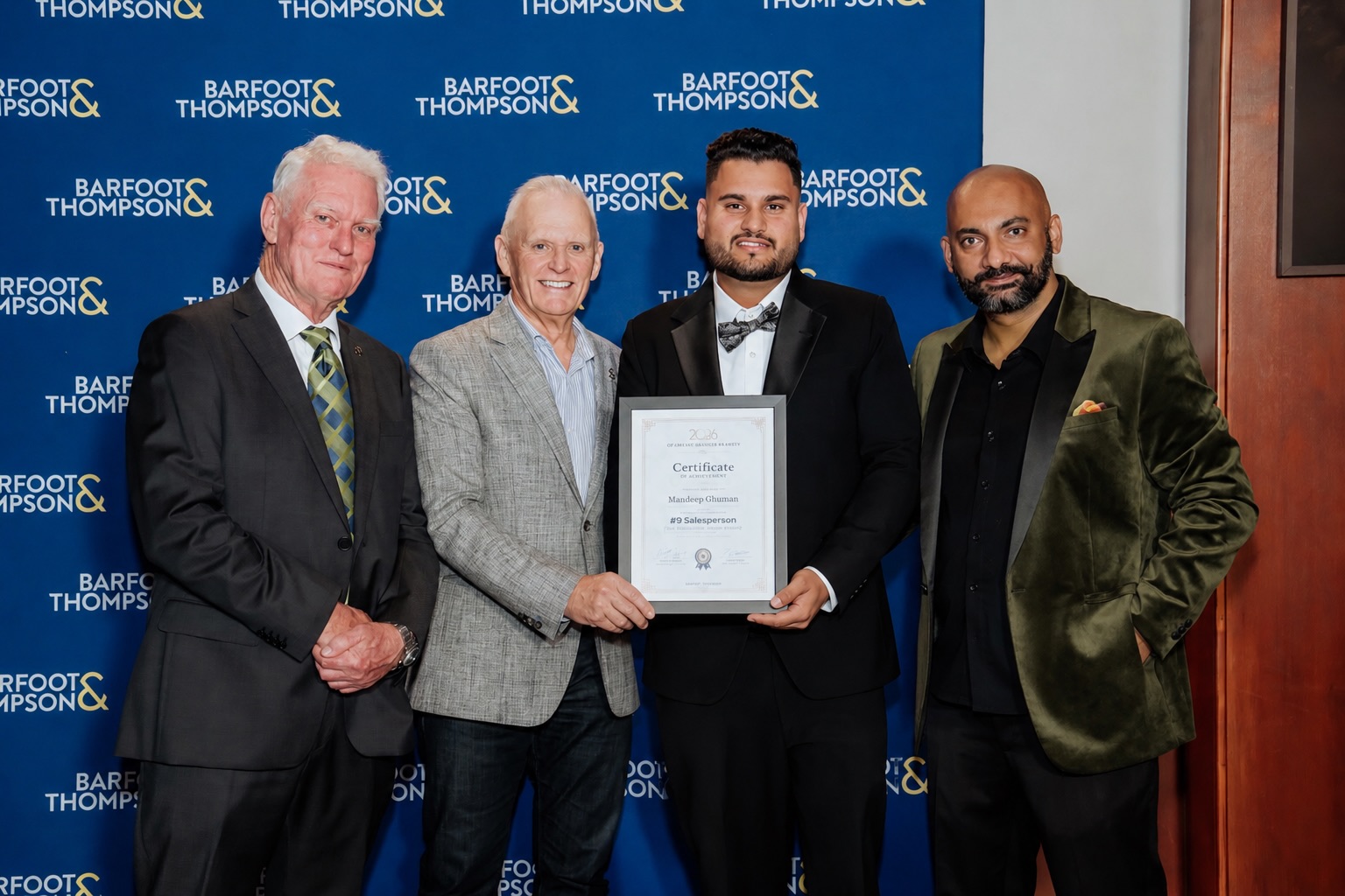 Mandeep Ghuman receiving Top 10 Salesperson award at Barfoot & Thompson Otahuhu Branch 2026 Annual Awards